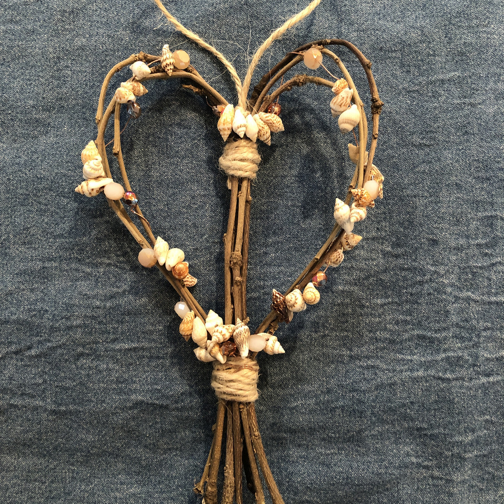 Twig heart with shells and crystals